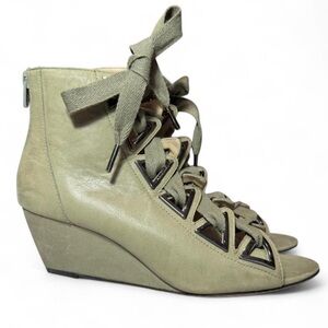 Jean-Michel Cazabat “Asia” lace-up wedge booties in sage green leather.